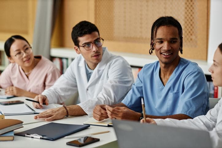 Diverse group of young medical professionals at seminar